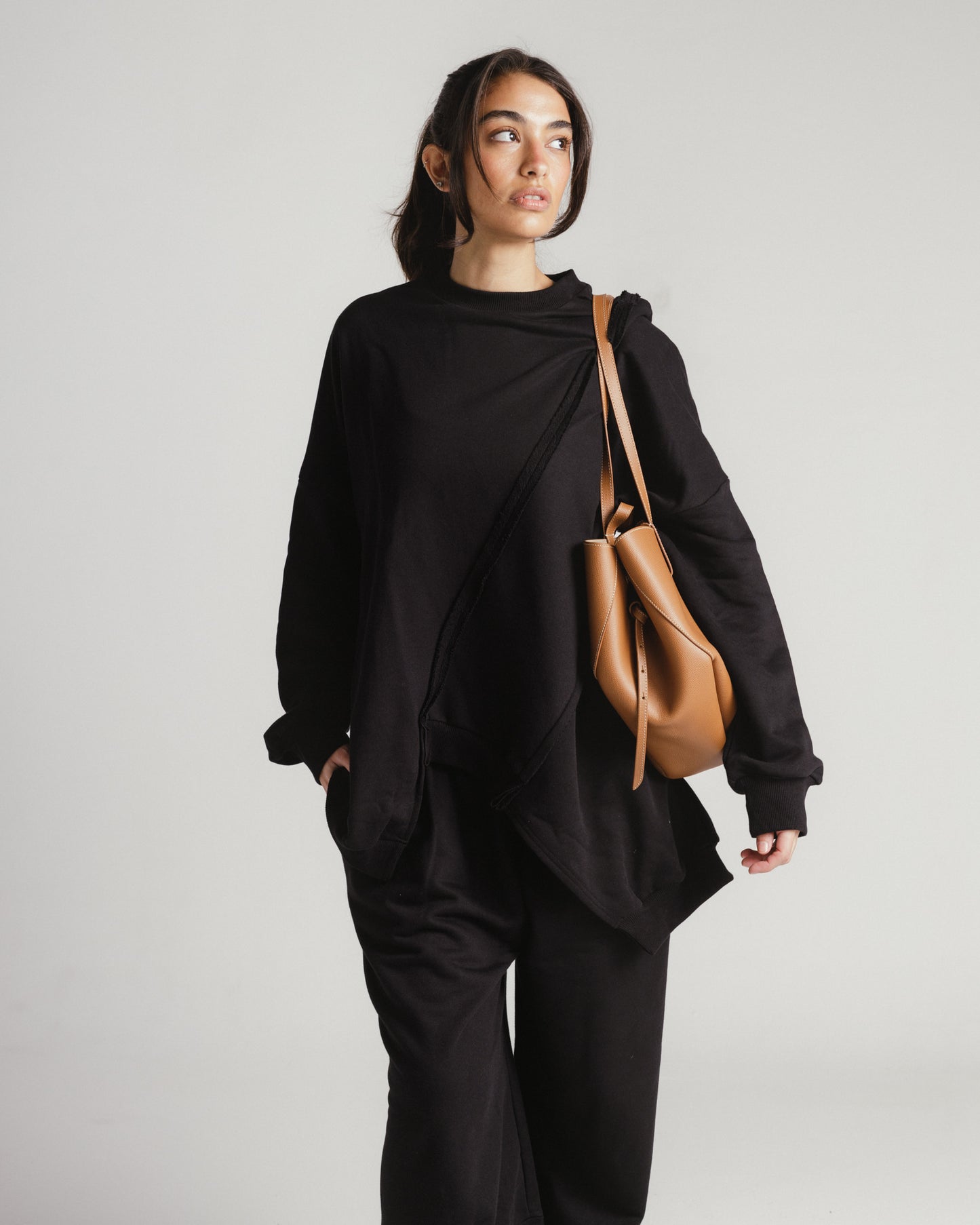 Asymmetrical sweatshirt and jogger set in black