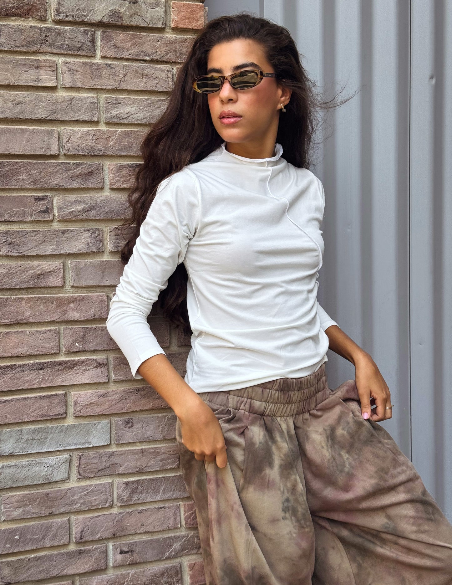 Tight long sleeve top in off white