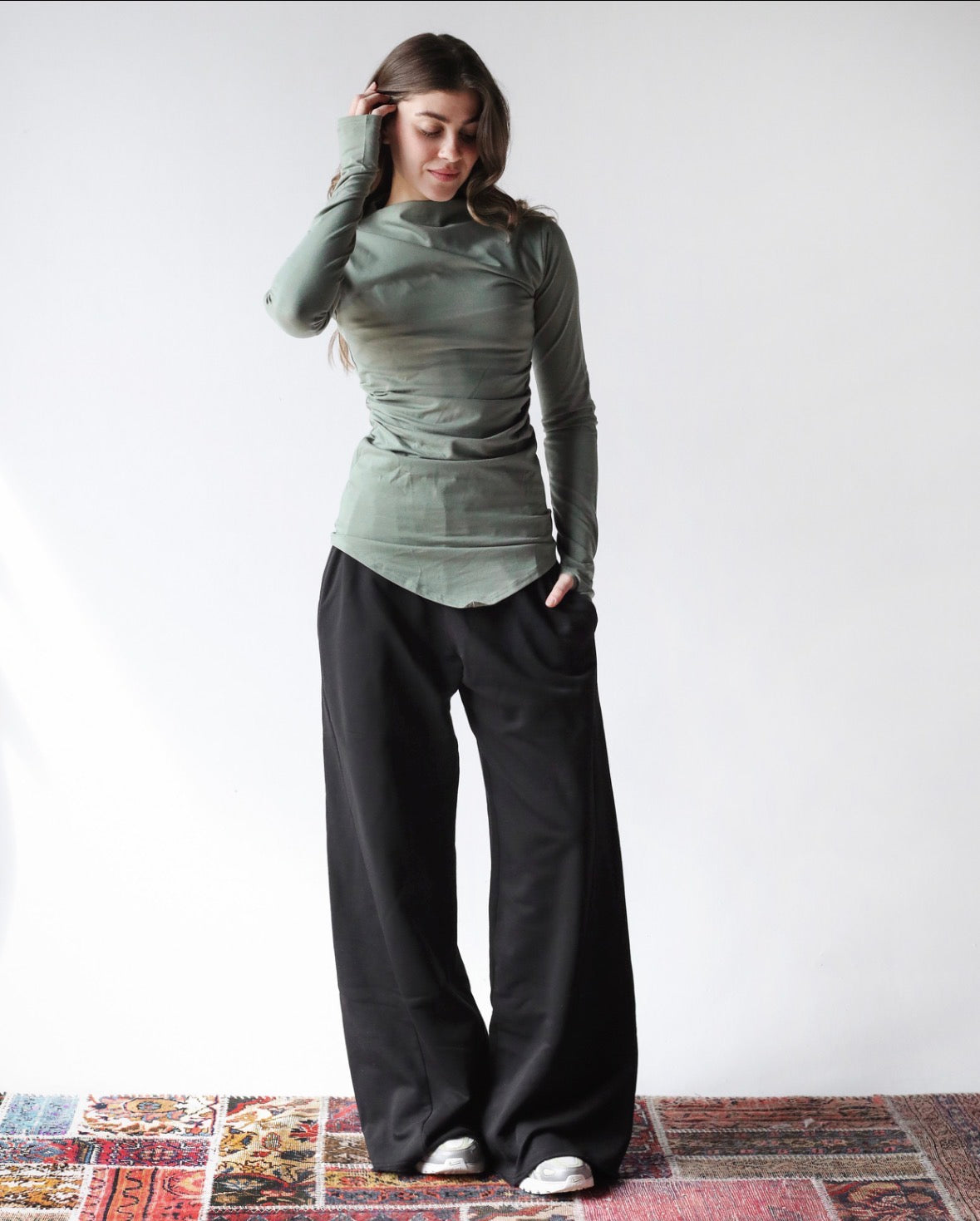 Sleek thumbhole sleeve top in olive green