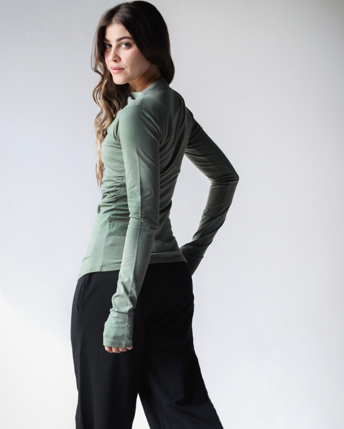 Sleek thumbhole sleeve top in olive green